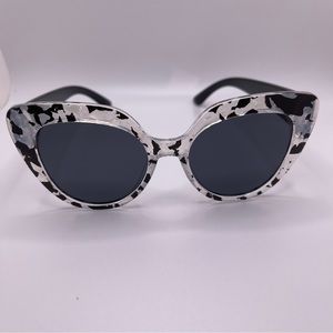 Retro Style Sunglasses. Translucent Frames with Black Arms. Gray lenses